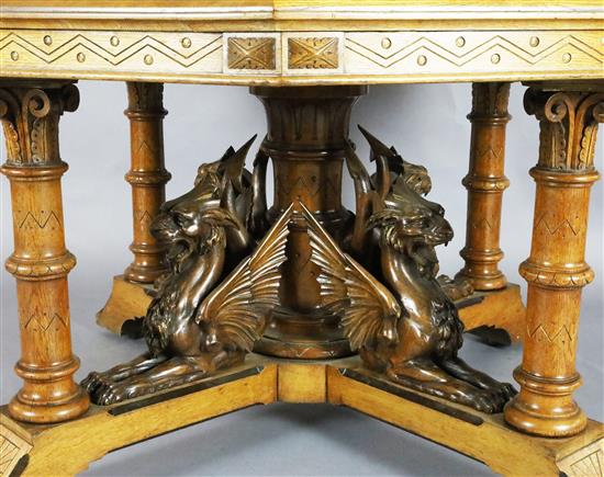 A Victorian Gothic revival golden oak centre table, Diam.4ft 2in. H.2ft 6in.